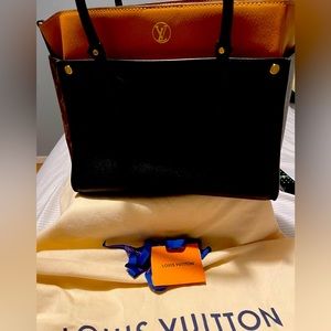 Original Louis Vuitton bag. Only used one time.